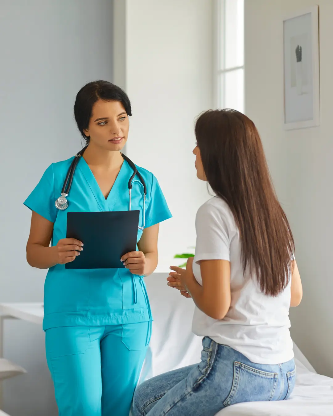 For SNFs A Crescent Wound Care clinician discussing a treatment plan with a patient